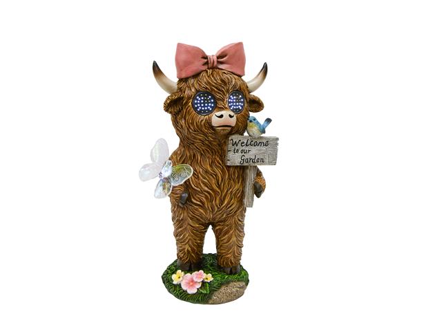 12.75" SOLAR POWER POLYRESIN HIGHLAND COW WITH SIGN